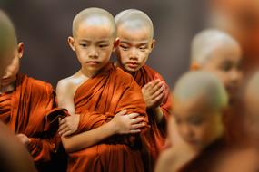 Theravada Buddhism Novices in a blurred background