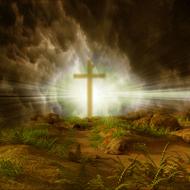 Silhouette of the cross, in smoke, in colorful light
