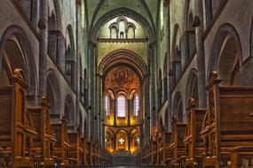 altar and benches in a medieval church