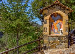 Beautiful and colorful Iconostasis among the green trees in Kalopanayiotis, Cyprus, Greece