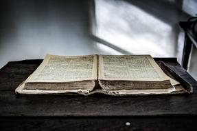 open book on a table in a church