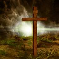 wooden cross in bright rays as an illustration