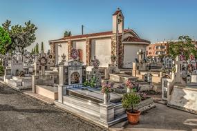 Beautiful and colorful cemetery with the plants, in Ayios Thomas, Paralimni, Cyprus, Greece