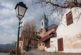 street lamp near beautiful Old Church