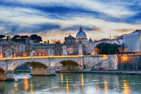 Landscape of the beautiful Tiber Bridge with colorful lights in Rome, Italy