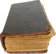 Beautiful, old Bible book with black cover, at white background
