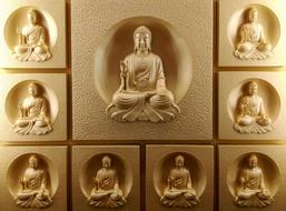 buddha statues on decorative wall
