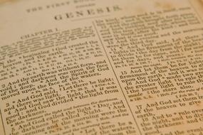 genesis, page of old bible, detail