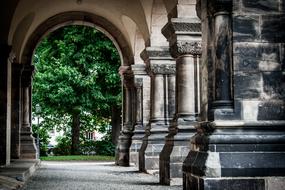 photo of arches and columns of the old stone monastery