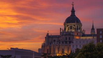 Beautiful church, with the colorful lights, in Madrid, Spain, at colorful and beautiful sunset