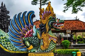 sculpture of a fairy dragon near the entrance to the temple