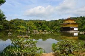 Rokuon-ji, Zen Buddhist temple, golden pavilion on water at summer, Japan, kyoto