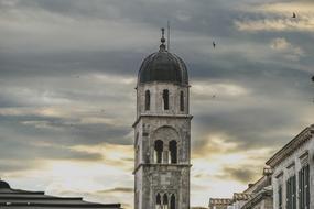church bell tower on the evening sky