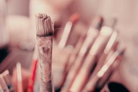 paint brushes on a blurred background