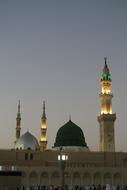 minarets and domes of Al-Masjid an-NabawÄ« mosque at dusk, Saudi Arabia, medina