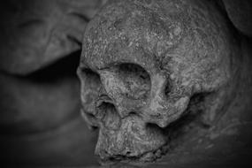 skull-shaped stone relief