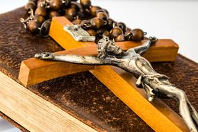 Cross Jesus Christ symbol on bible