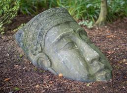 stone Buddha Head on ground