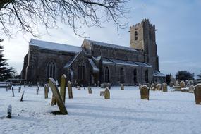 graveyard in the courtyard near the church in winter