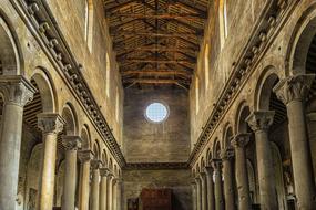 architecture with columns in a cathedral in italy