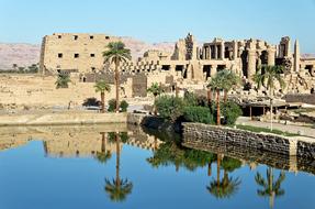 Karnak Temple mirroring on water, Egypt, Luxor
