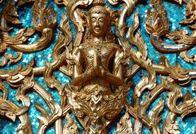 golden buddha meditating, ornament