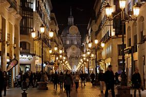 picture of the crowd of People on pedestrian street in front of church in Night City