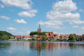 church in old town on lake shore at summer, germany, Mölln Moellner