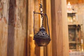antique lamp in the interior of the church