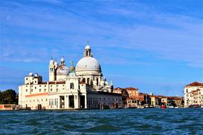 historic architecture of venice near water on a sunny day