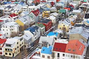 Top view of the beautiful and colorful houses in snow in Reykjavik, Iceland in winter