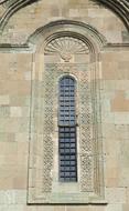 photo of the window of an old church in Mtskheta, Georgia