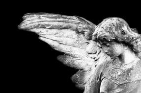 Beautiful, black and white sculpture of the Angel, at black background, clipart