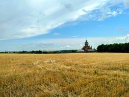 distant view of the church in the field