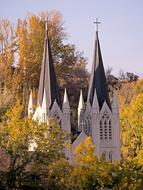 Cathedral spiers among autumn trees in Canada, Alberta