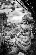statue of calm Buddha in the garden