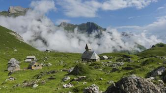 small church in the picturesque mountains of switzerland