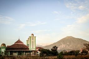 beautiful photo of a mosque on a mountain background
