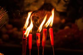 burning candles in a temple in Hong Kong