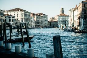 Beautiful landscape of the turquoise channel, among the buildings in Venice, Italy