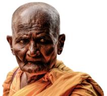 photo of an old buddhist monk on a white background