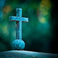 stone cross in an old cemetery