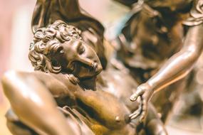 beauty of a woman in sculpture