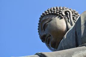 photo of the head of the divine buddha statue