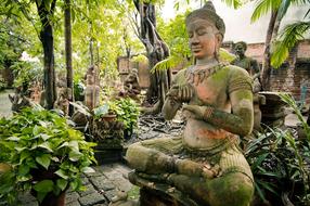 Buddha garden green Statue