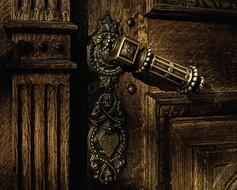 antique doorknob in a church in Ljubljana, Slovenia