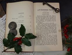 Christmas Holly Antique book with red berries and key decorations