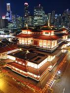 panoramic view of buddha tooth relic temple in night illumination