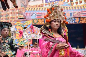 People in colorful and beautiful, traditional costumes on the festival, near the Daija Jenn Lann Temple, Taichung City, Taiwan