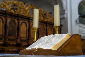 Book Bible and candles